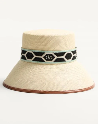VALENTINO GARAVANI VALENTINO GARAVANI ANTIBES STRAW BUCKET HAT WITH LEATHER TRIM AND DIAMOND PATTERN RIBBON WOMAN NATUR