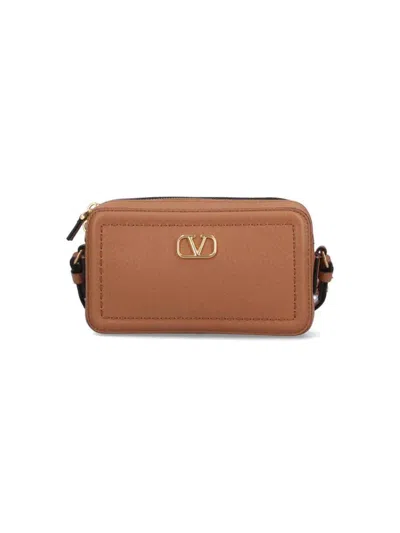 Valentino Garavani Mini Leather Crossbody Bag With Adjustable Strap In Brown