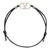 Valentino Garavani Garavani Vlogo Signature Cotton Bracelet Woman Black Uni In Black