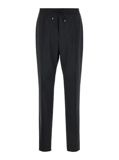 Valentino Garavani Black Jogger Pants With Logo Patch In Wool Blend Man