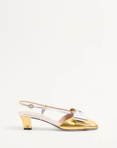 VALENTINO GARAVANI VALENTINO GARAVANI BOWOW SLINGBACK PUMPS IN LAMINATED NAPPA 45MM WOMAN GOLD/SILVER 42