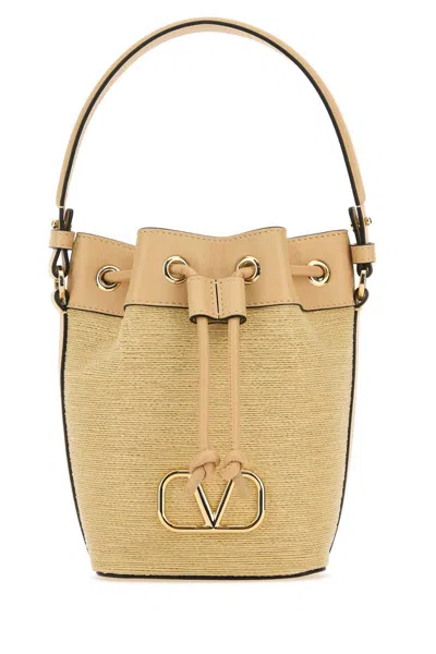 Valentino Garavani Mini Vlogo Signature Drawstring Bag In Beige O Tan