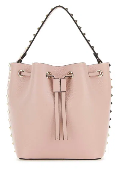 Valentino Garavani Leather Bucket Bag Featuring Rockstud Accents In Pink