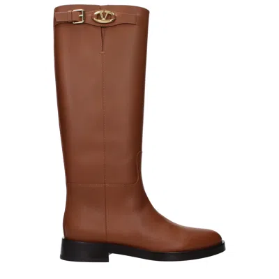 Valentino Garavani Buckle-trimmed Leather Boot In Brown