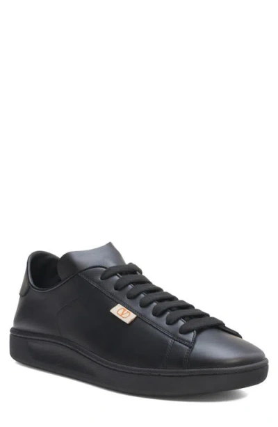 Valentino Garavani Calfskin Leather Sneaker In Nero/pumpkin/nero