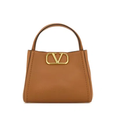 Valentino Garavani Camel Leather Medium Alltime Handbag In Sand