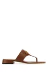 Valentino Garavani Women Caramel Leather Vlogo Thong In Brown