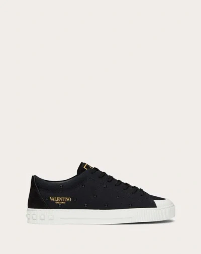 Valentino Garavani Cityplanet Trainer In Sustainable Canvas And Recycled Nylon Studs In Black