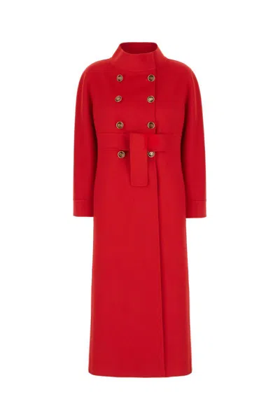 Valentino Garavani Coats In Red