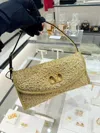 Valentino Garavani Mini Structured Handbag With Signature Detailing In Gold