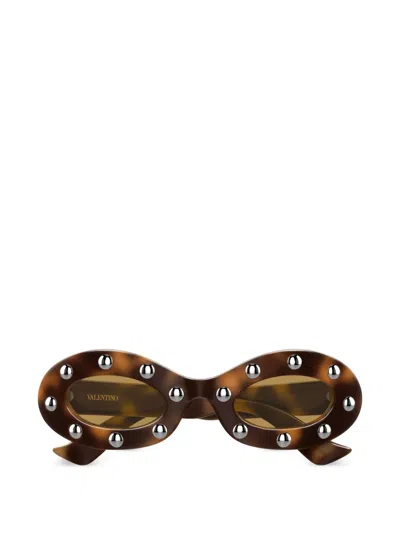Valentino Garavani Eyewear Stud-embellished Oval-frame Sunglasses In Brown