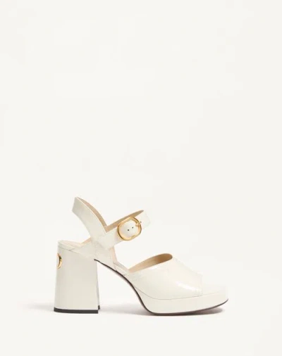 VALENTINO GARAVANI VALENTINO GARAVANI FAWCETTE PLATFORM SANDAL IN POLISHED CALFSKIN 100MM WOMAN IVORY 40.5