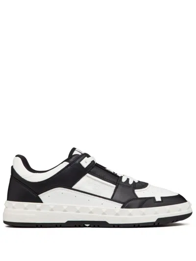 Valentino Garavani 'freedots' White And Black Low Top Sneakers With Studs In Leather Man