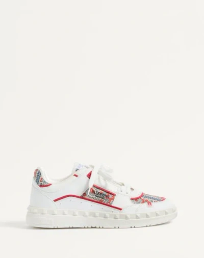 VALENTINO GARAVANI VALENTINO GARAVANI FREEDOTS LOW-TOP TRAINER IN CALFSKIN AND VOYAGE IMAGINAIRE FABRIC