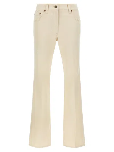 Valentino Garavani Garment-dyed Flared Jeans In Cream