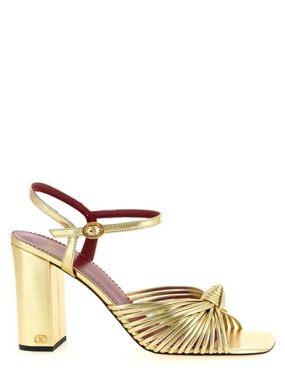 Valentino Garavani Gold Goatskin Stiletto Heel Women's Sandals In Animal Print
