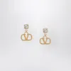 Valentino Gold Vlogo Signature Earrings With Silver Swarovski
