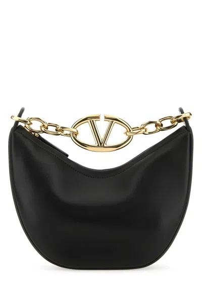 Valentino Garavani Handbags. In Black