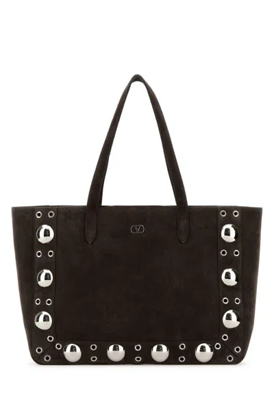 Valentino Garavani Handbags. In Brown