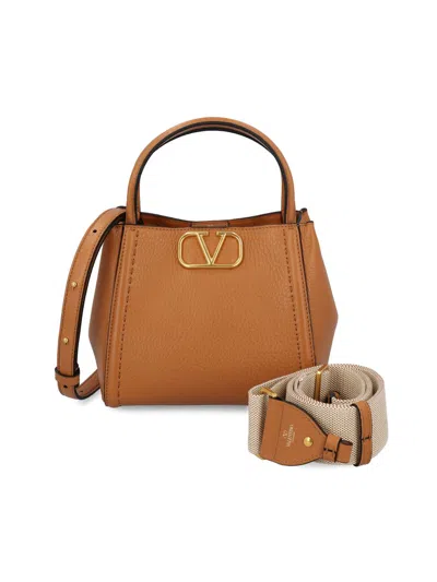 Valentino Garavani Handbags In Brown