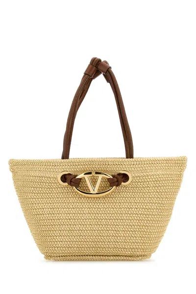 Valentino Garavani Handbags. In Beige O Tan