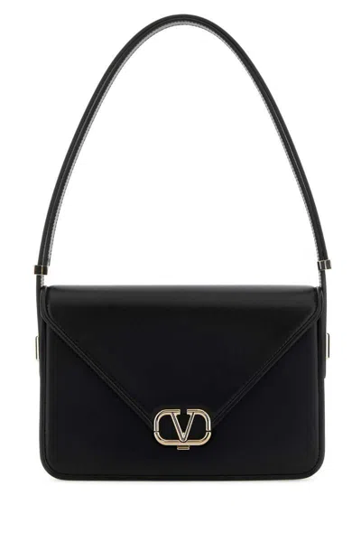 Valentino Garavani Handbags. In Black