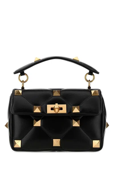 Valentino Garavani Handbags. In Black