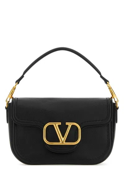 Valentino Garavani Handbags. In Black