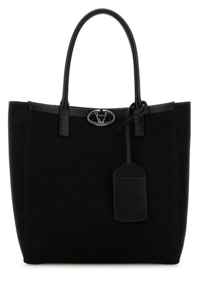 Valentino Garavani Handbags. In Black