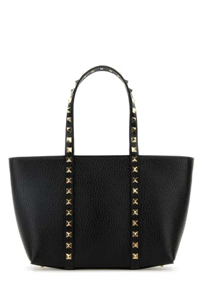 Valentino Garavani Handbags. In Black