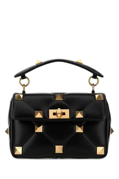 Valentino Garavani Handbags. In Black