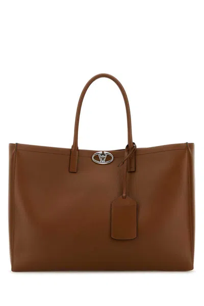 Valentino Garavani Handbags. In Brown