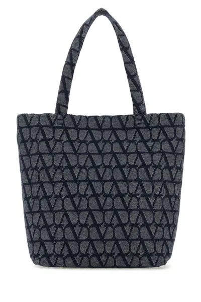 Valentino Garavani Handbags. In Black