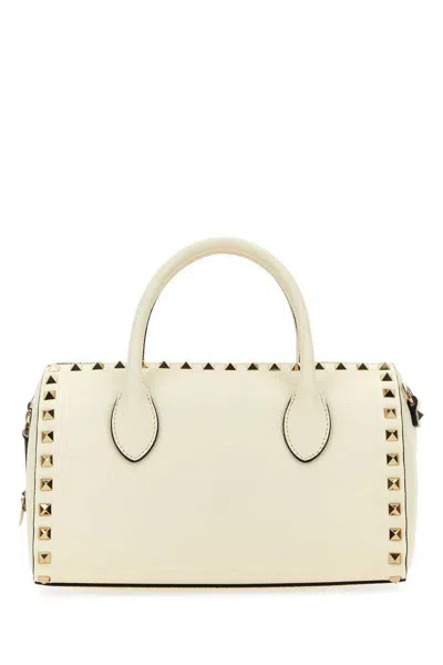 Valentino Garavani Handbags. In White