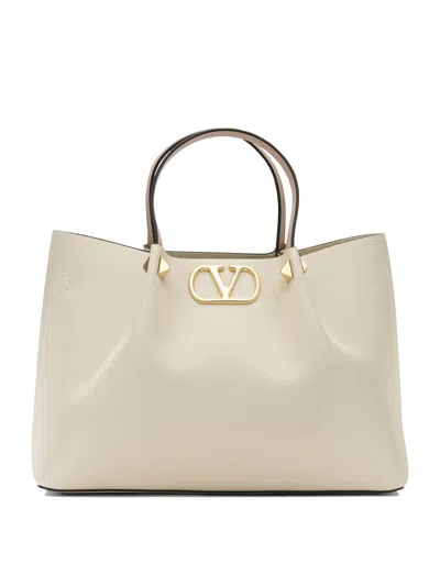 Valentino Garavani Handbags In White