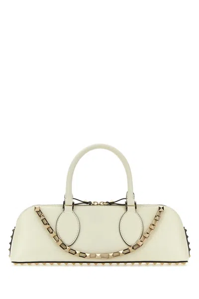 Valentino Garavani Ivory Leather Rockstud East-west Handbag In Neutral