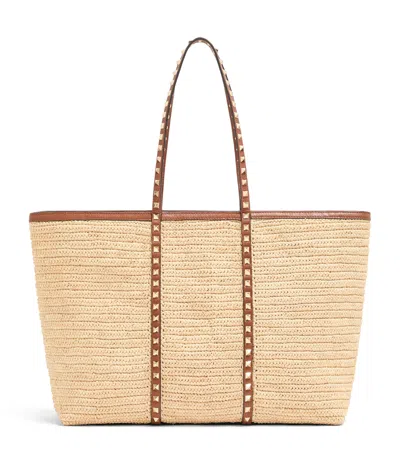Valentino Garavani Large Straw Rockstud Tote Bag In Neutral