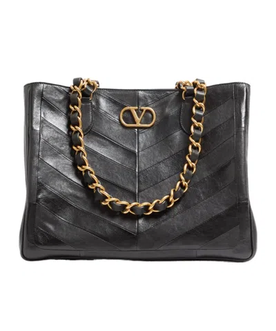 Valentino Garavani Laseine Shopping Bag In Nappa Leather With A Chevron Pattern In Black