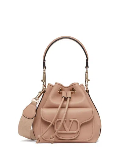 Valentino Garavani Locò Small Leather Drawstring Handbag In Pink