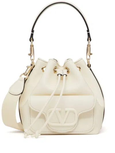Valentino Garavani Locò Small Leather Drawstring Bag In White