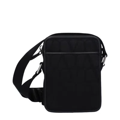 Valentino Garavani Logo-embossed Fabric Crossbody Bag In Black