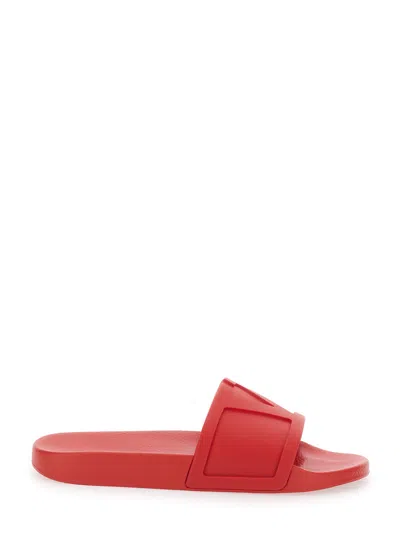 Valentino Garavani Logo-embossed Rubber Slide Sandal In Red