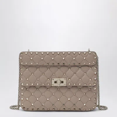 Valentino Garavani Medium Rockstud Spike Bag In Powder Pink Nappa Leather