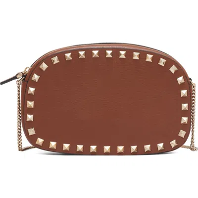 Valentino Garavani Mini Rockstud Leather Crossbody Bag In Brown