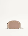 Valentino Garavani Mini Rockstud Shoulder Bag In Grainy Calfskin Woman Poudre Uni In Pink