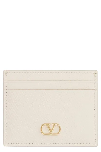Valentino Garavani Pebbled Calfskin Vlogo Card Case In Beige