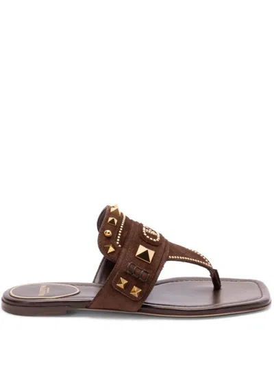 VALENTINO GARAVANI VALENTINO GARAVANI PLASTER CASTER FLIP FLOPS WITH GOLD ACCENTS AND OPEN TOE