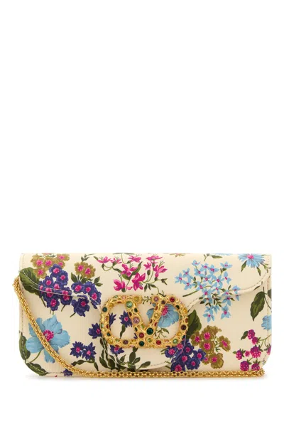 Valentino Garavani Printed  Fabric Locò Clutch In White