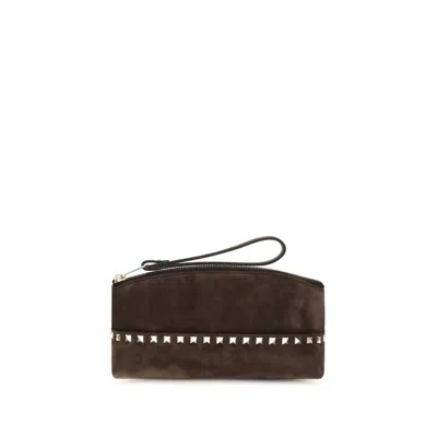 Valentino Garavani Pyramid Stud Suede Clutch In Brown