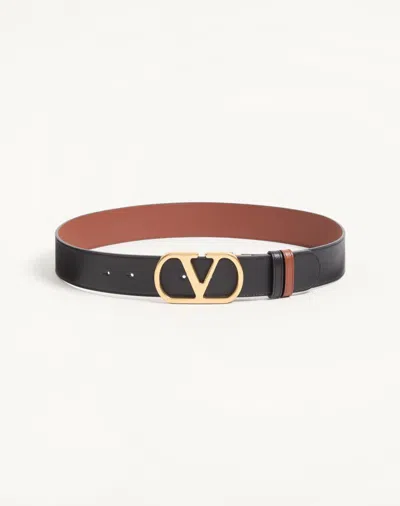 VALENTINO GARAVANI VALENTINO GARAVANI REVERSIBLE VLOGO SIGNATURE BELT IN GLOSSY CALFSKIN 40 MM WOMAN BLACK/DEEP CARAMEL